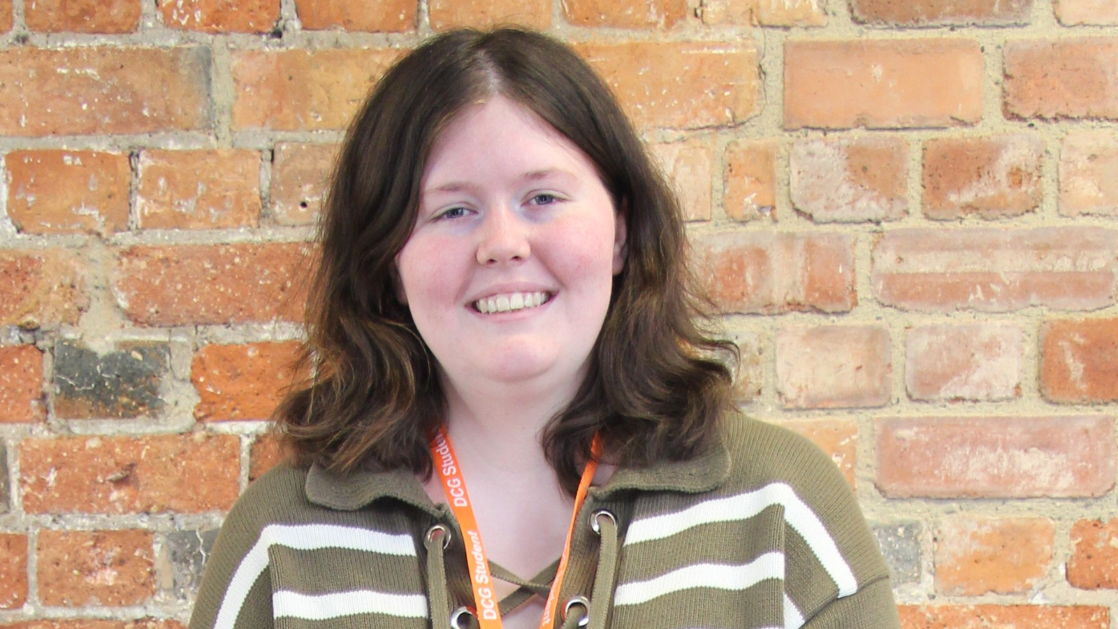 Former student Charlotte Willis after completing Level 1 adult social care via SWAP, highlighting learner success.